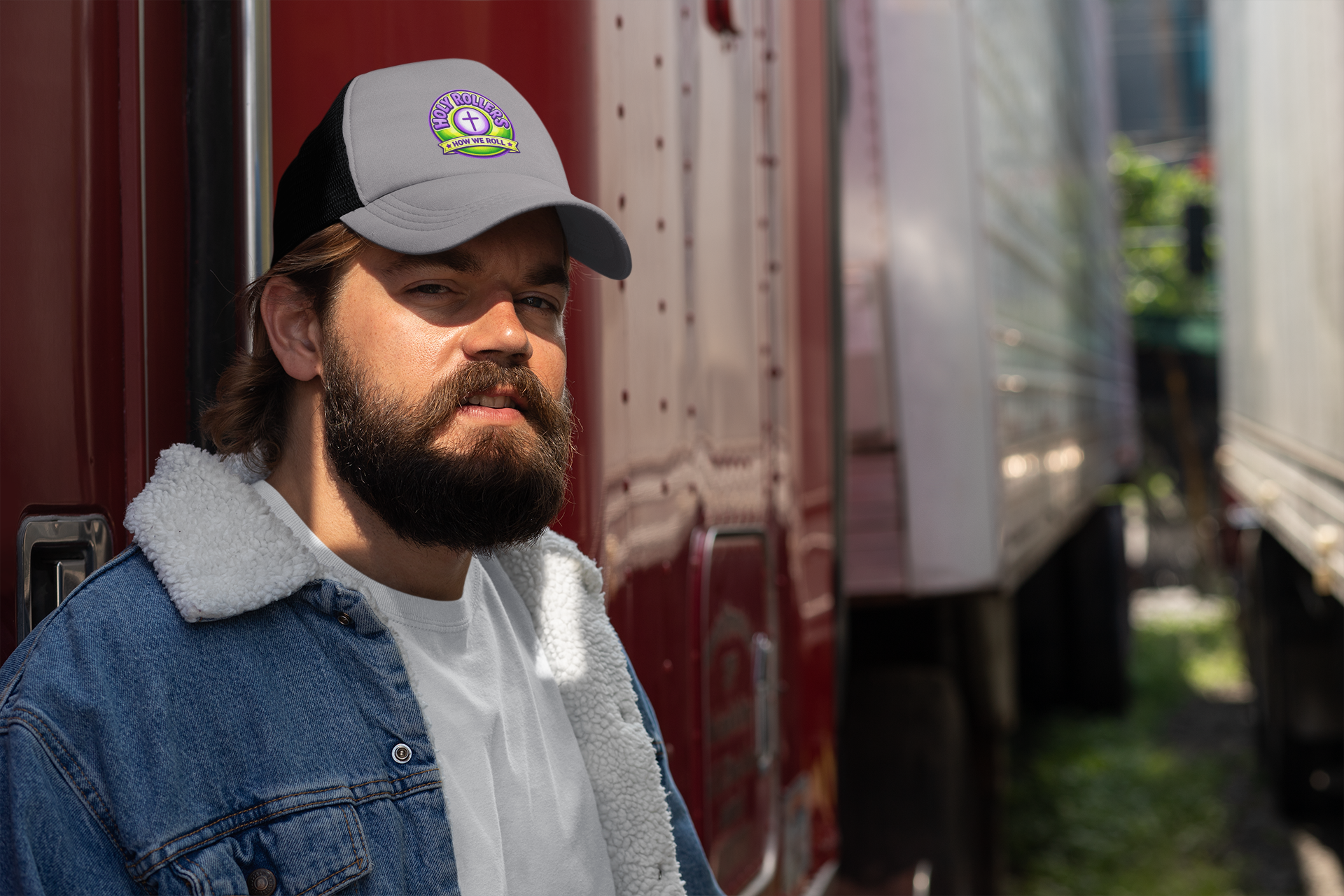 Holy Rollers Christian apparel: Holy Rollers cross logo Trucker Hat | How We Roll emblem