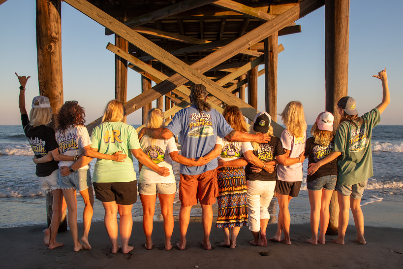 Friends wearing Holy Rollers shirts